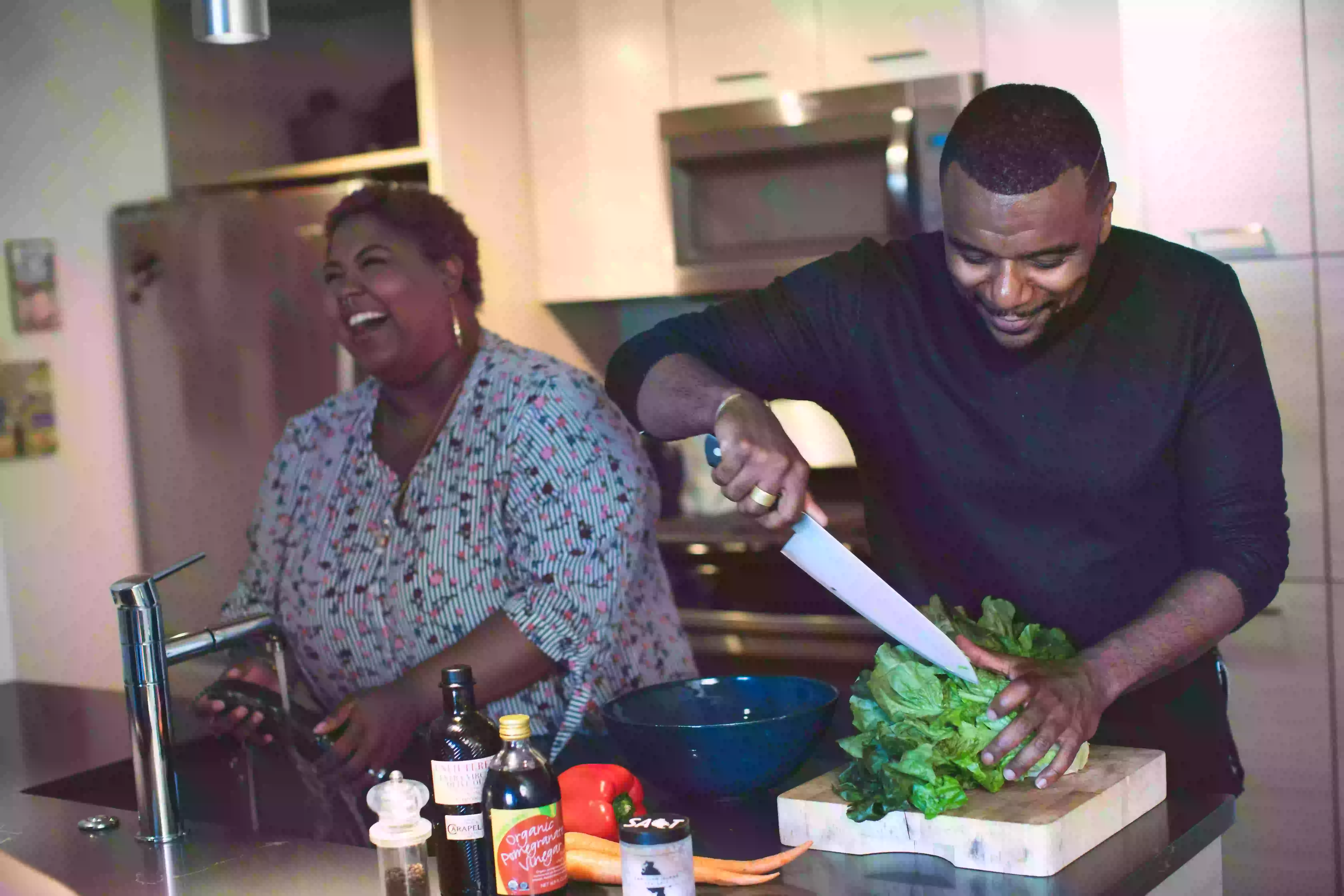 happy couple cooking you don't really need to lose weight