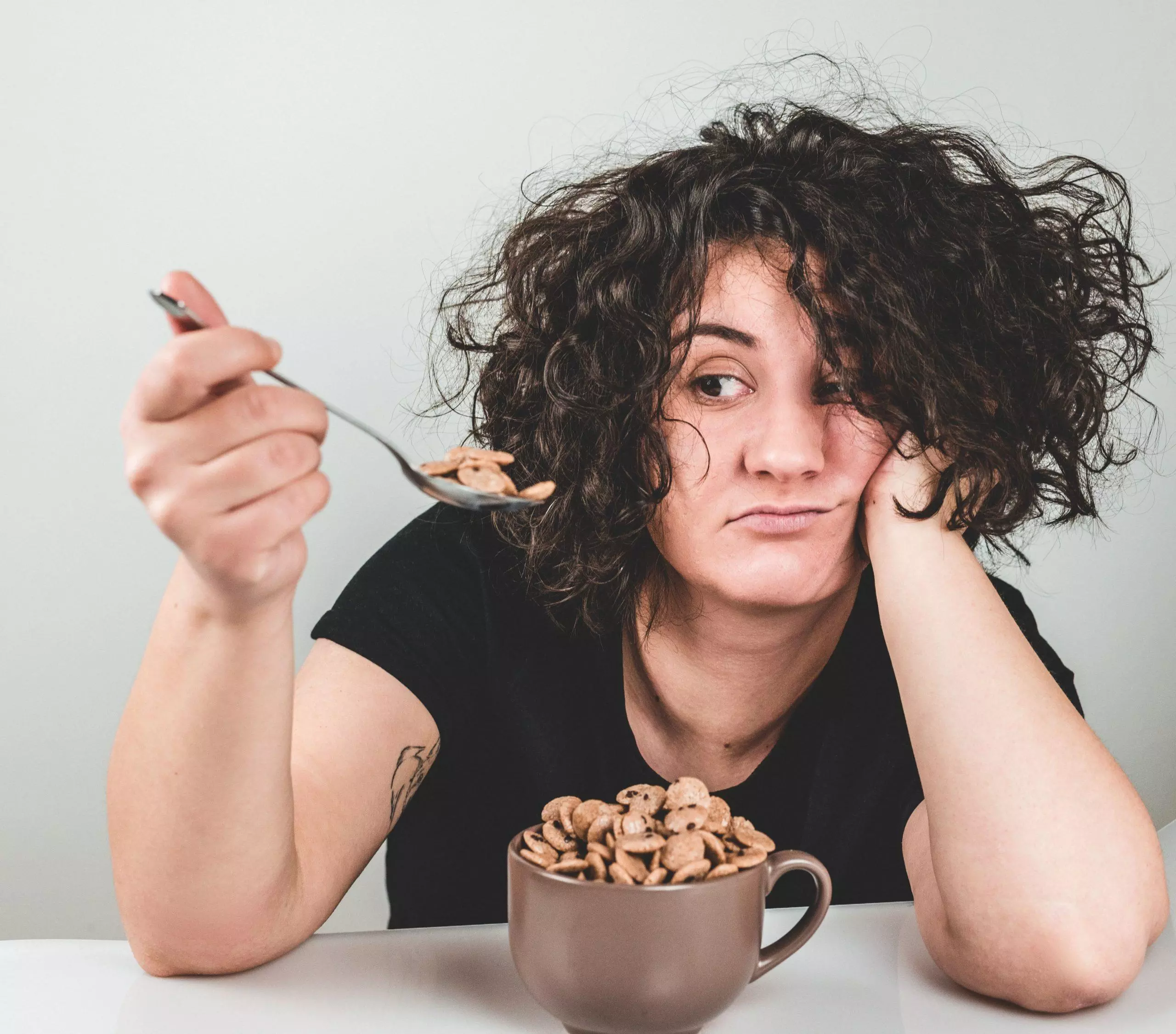 woman eating cereal