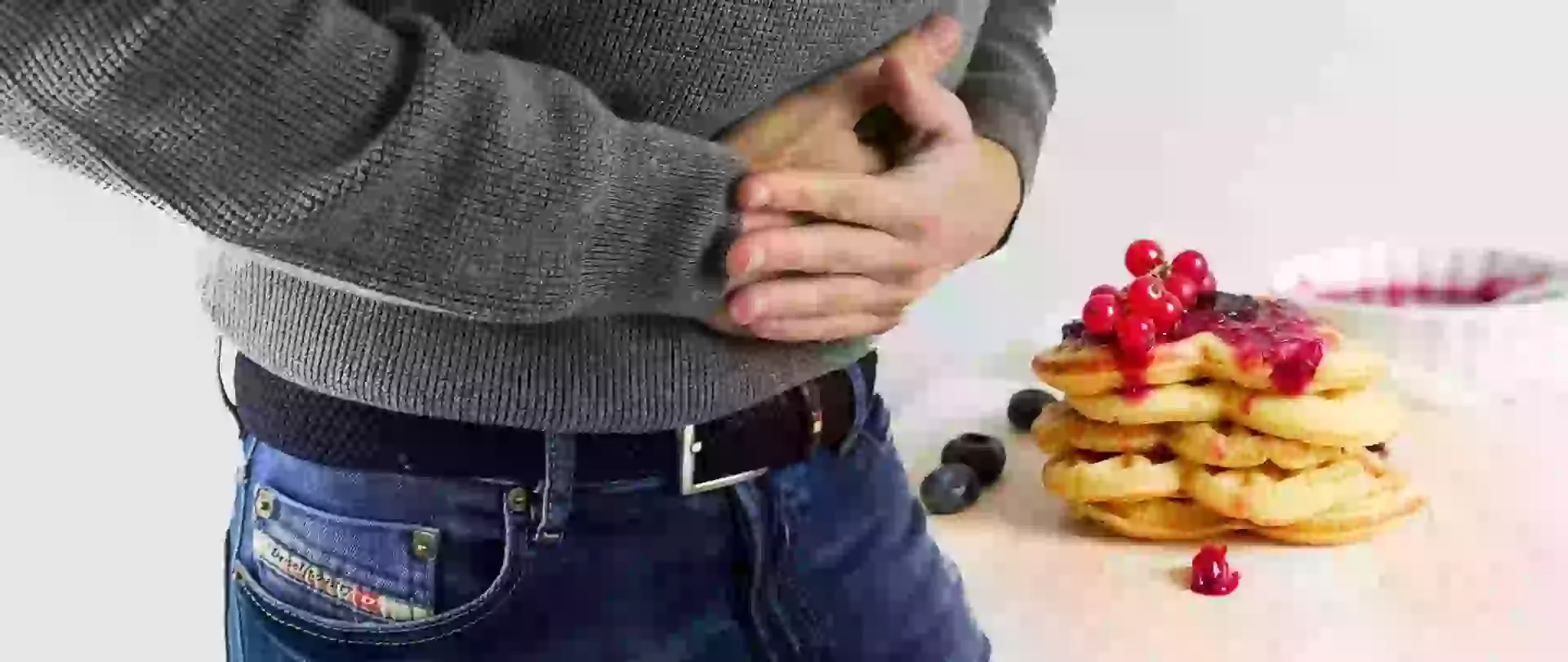 man with hurting stomach