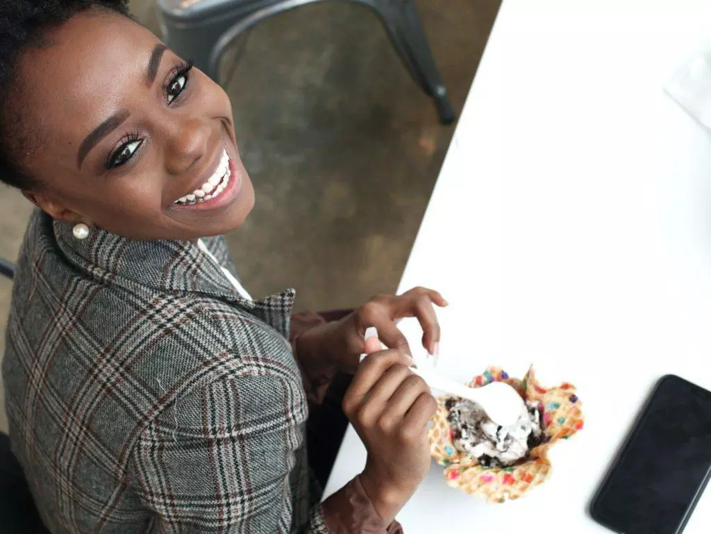 woman eating happily