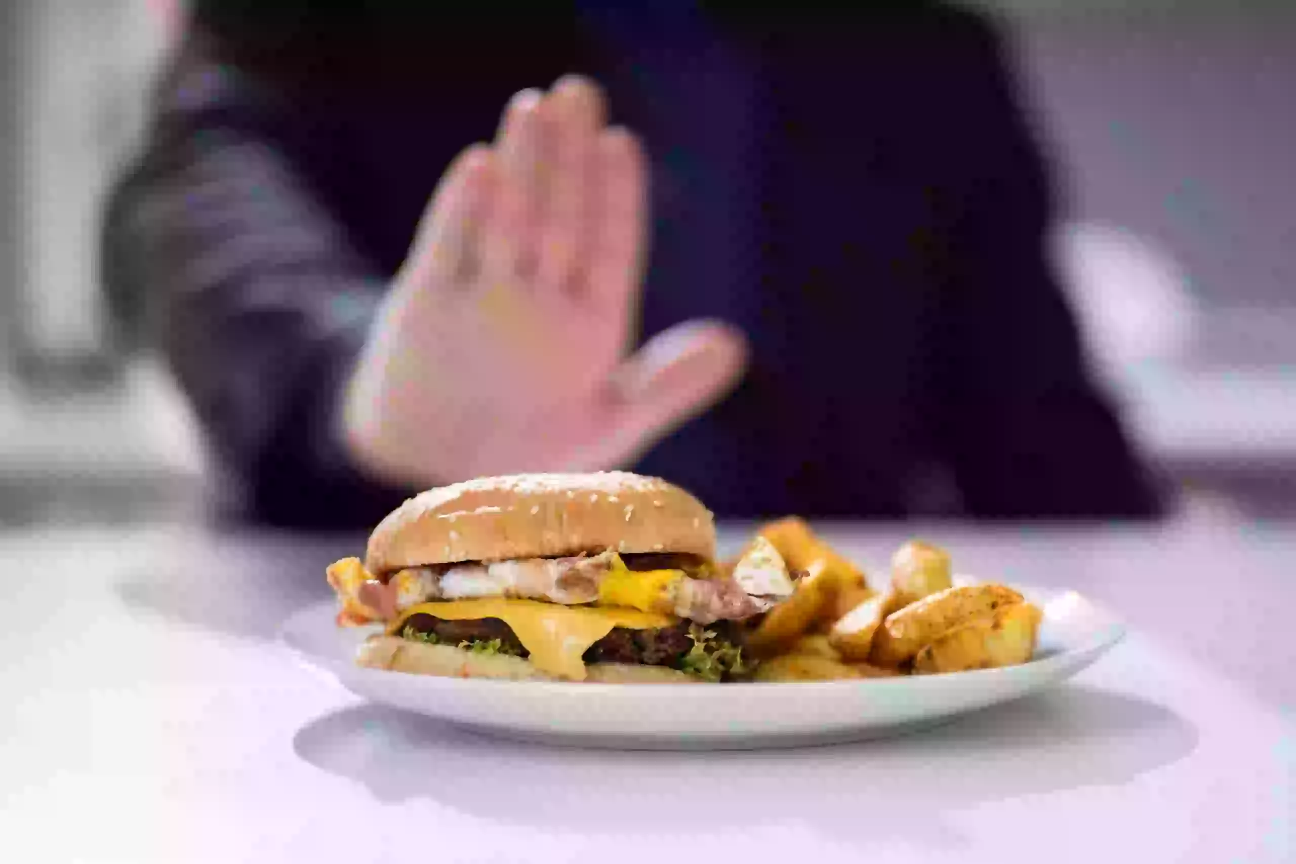 Man Refusing To Eat Burger