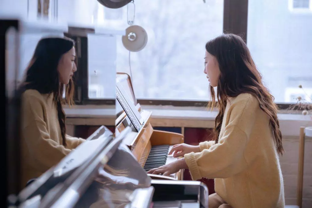 woman playing piano