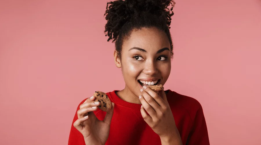 woman eating cookie