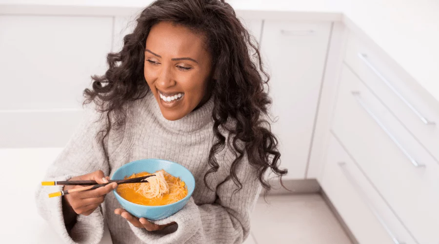 woman eating happily